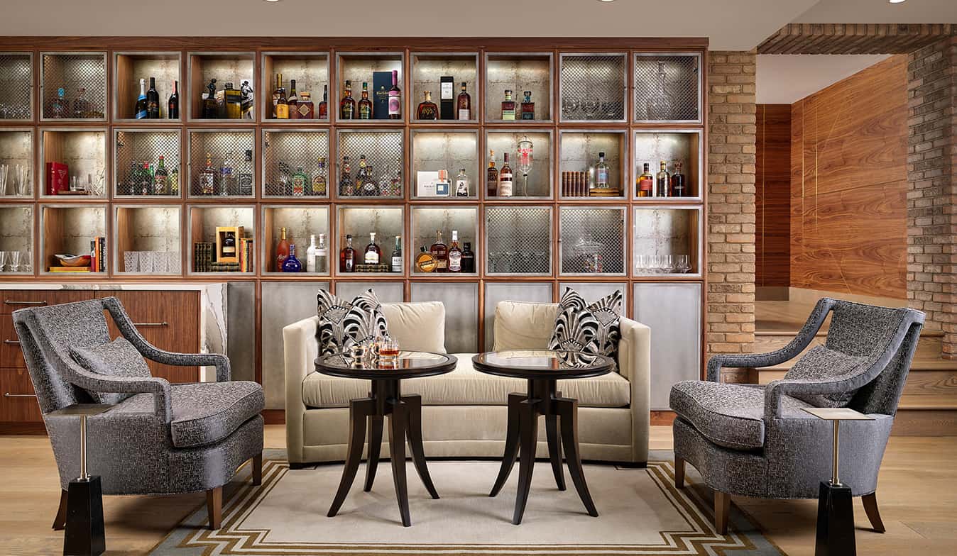 Custom full speakeasy basement bar and movie theater hero